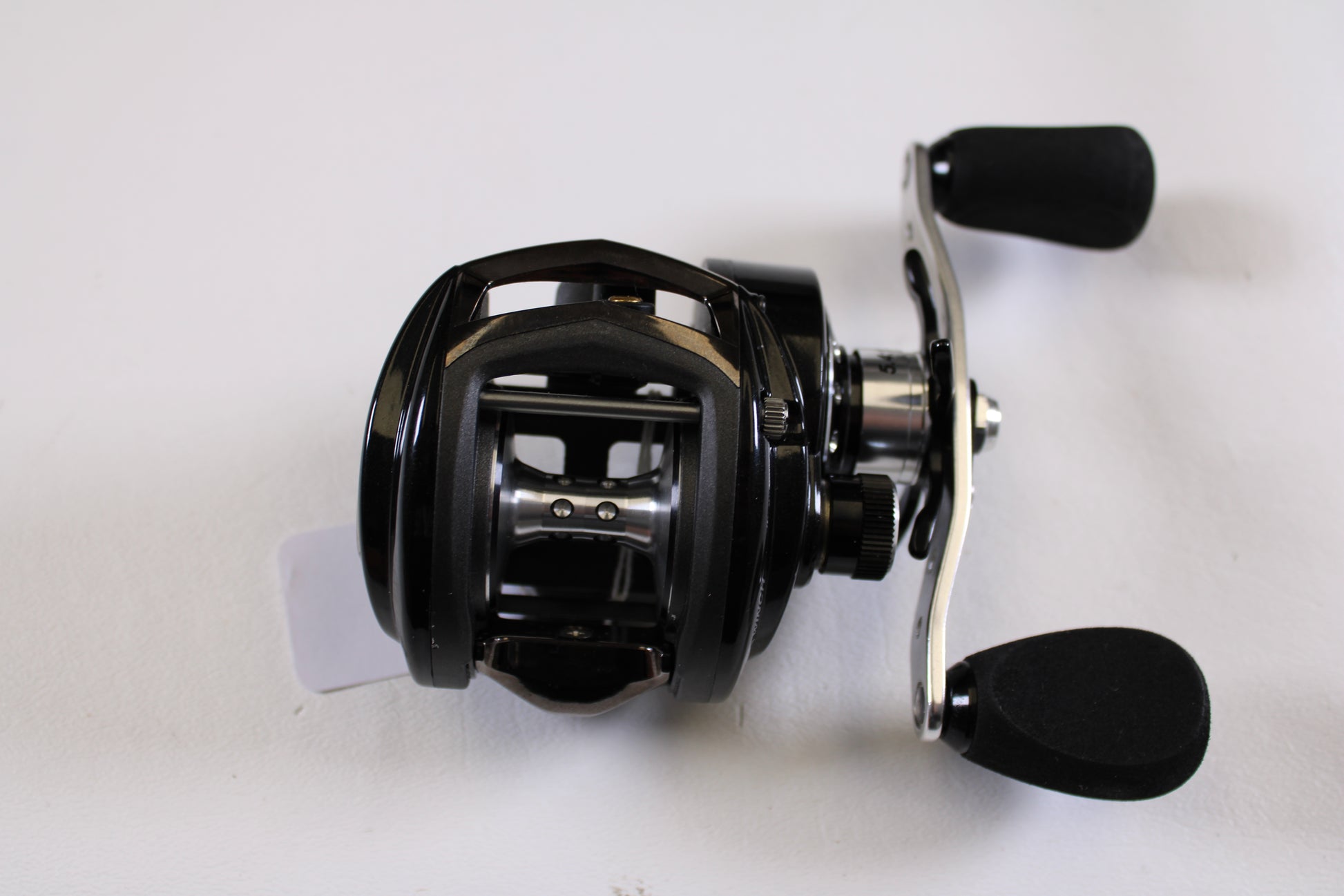 A close-up of the Abu Garcia Revo Winch Gen 2 5.4:1 RH Used Casting Reel in excellent condition—ideal for upgrading through our Rod and Reel Trade-In Program or shopping quality used Abu Garcia gear.