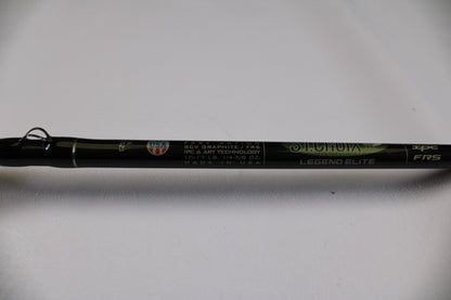 A close-up of a used St. Croix Legend Elite EC70MF 7'0" Medium casting rod in excellent condition shows details like "SCV graphite/FRS" and "10-17 LB, 1/4-5/8 OZ." Eligible for our Rod and Reel Trade-In Program for store credit.
