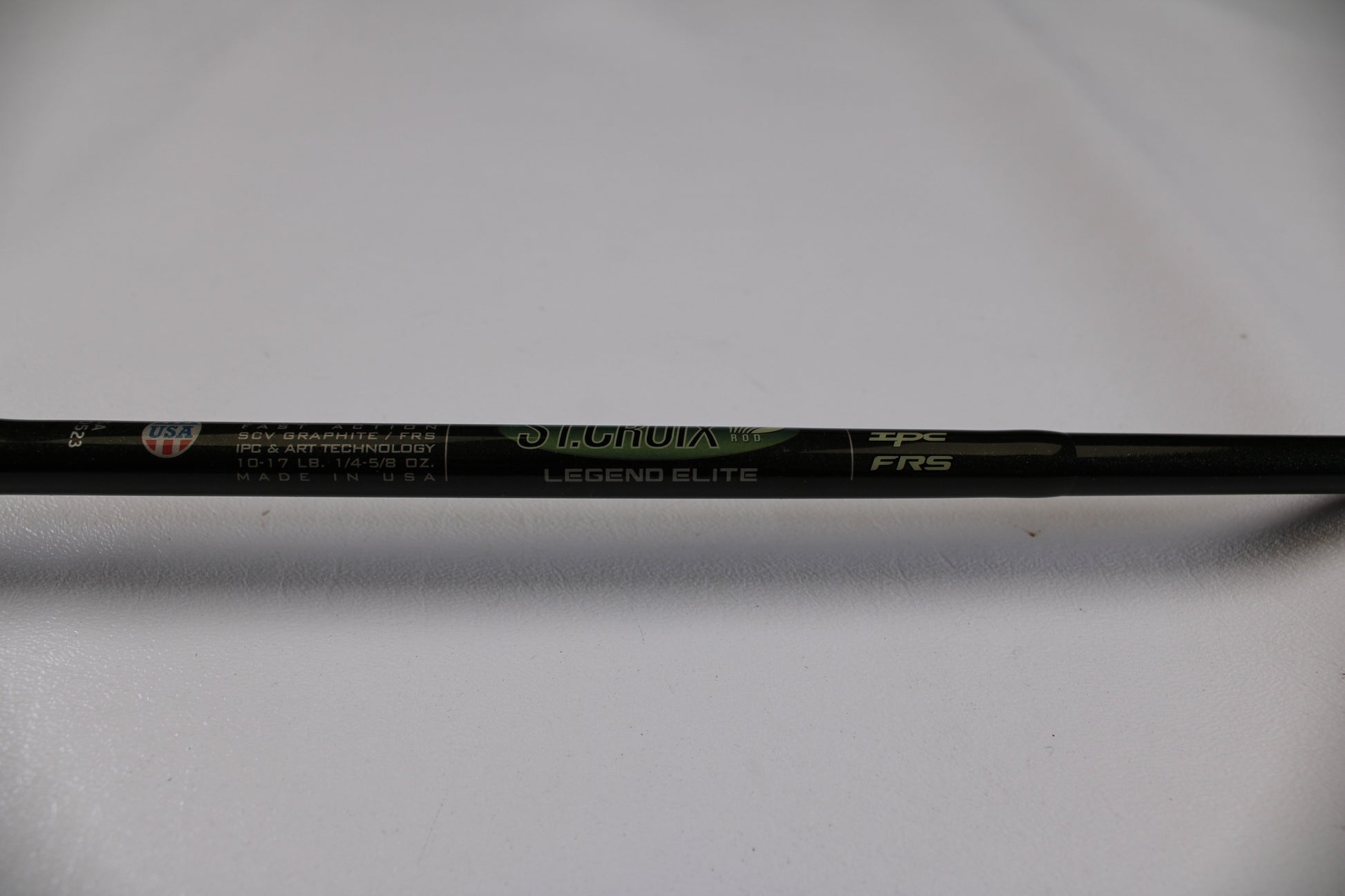 A close-up of the St. Croix Legend Elite EC70MF 7'0" Medium Used Casting Rod in excellent condition, featuring SCV graphite, IPC tech, and "Made in USA." Trade-in your gear for store credit with our Rod and Reel Trade-In Program.