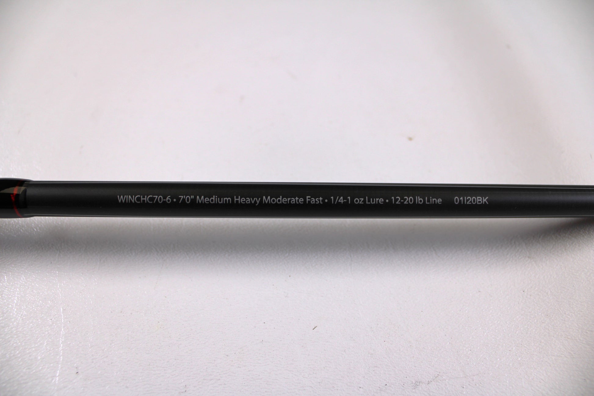 A close-up of a used Abu Garcia Winch WINCHC70-6 7'0" Medium Heavy casting rod in excellent condition, ideal for those joining the Nation's Best Rod and Reel Trade-In Program or shopping for quality used gear.