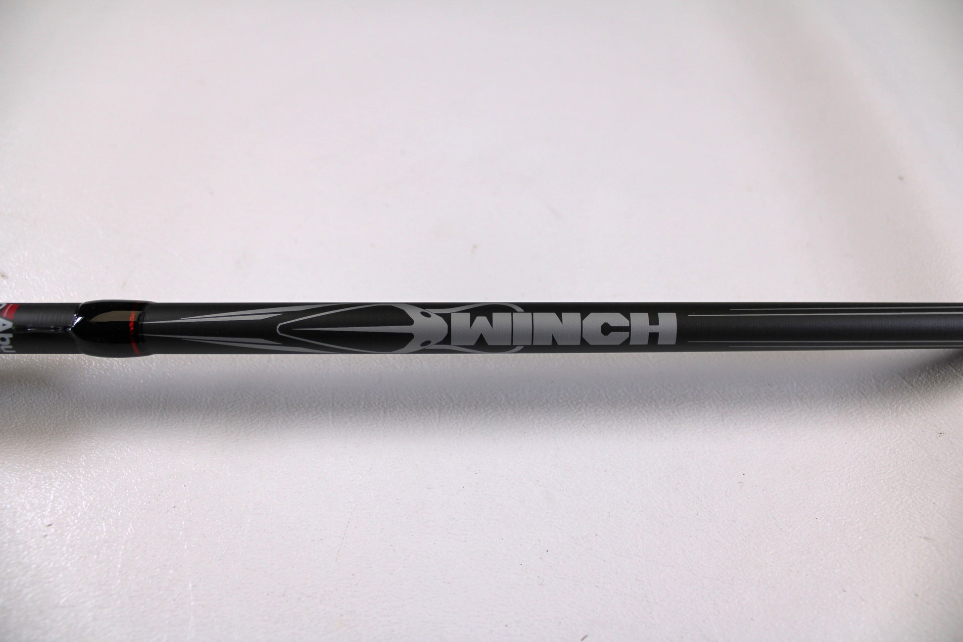A close-up of the Abu Garcia Winch WINCHC70-6 7'0" Medium Heavy Used Casting Rod in excellent condition—ideal for anyone interested in the Nation's Best Rod and Reel Trade-In Program.
