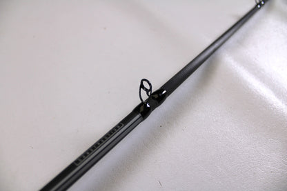 Close-up of an Abu Garcia Winch WINCHC70-6 7'0" Medium Heavy Used Casting Rod in excellent condition, with a visible guide ring—ideal for those joining the Nation's Best Rod and Reel Trade-In Program.