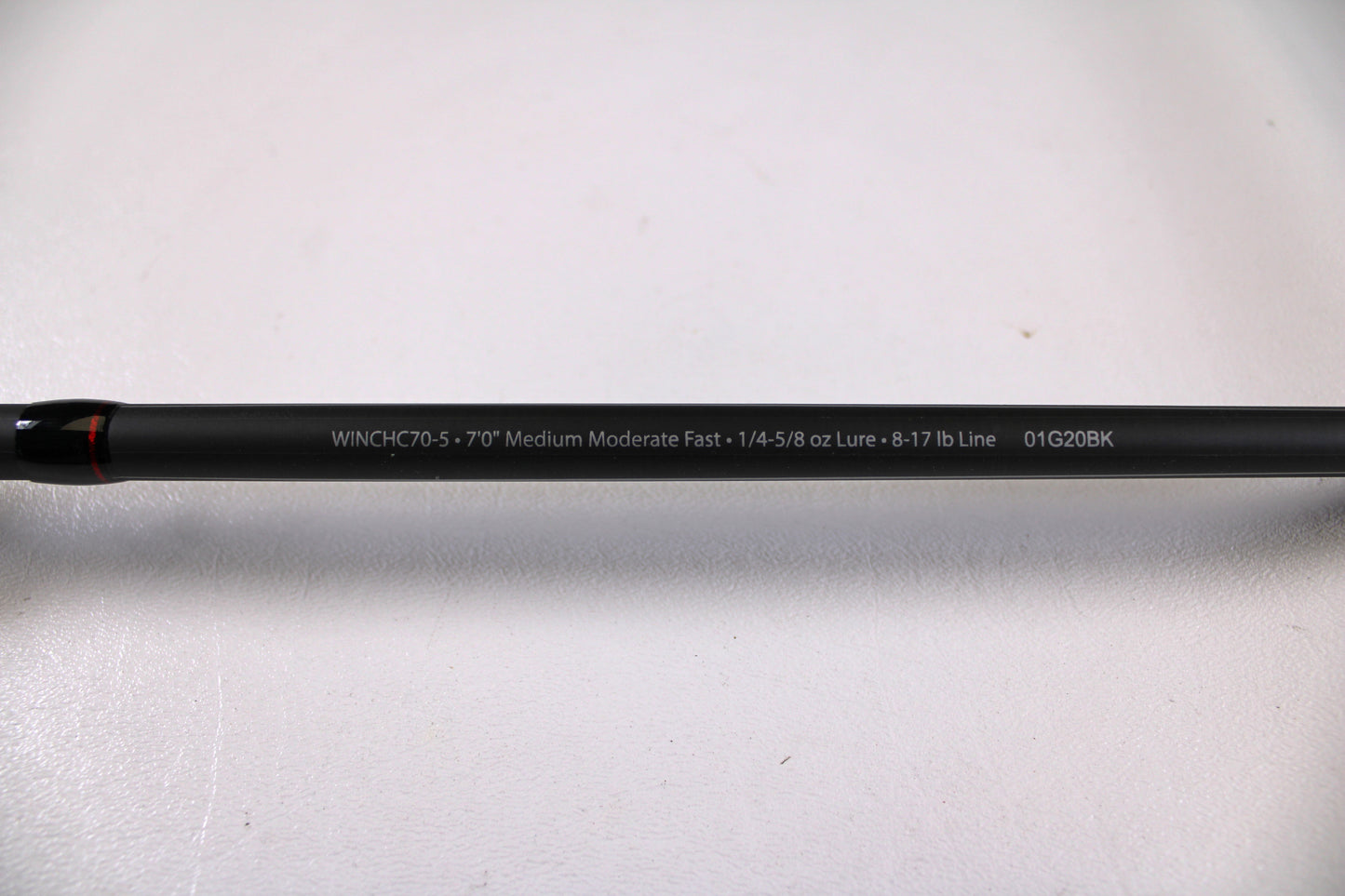 Close-up of Abu Garcia Winch WINCHC70-5 7'0" Medium Used Casting Rod in excellent condition, displaying rod details on white. Trade up with the Nation's Best Rod and Reel Trade-In Program for store credit.