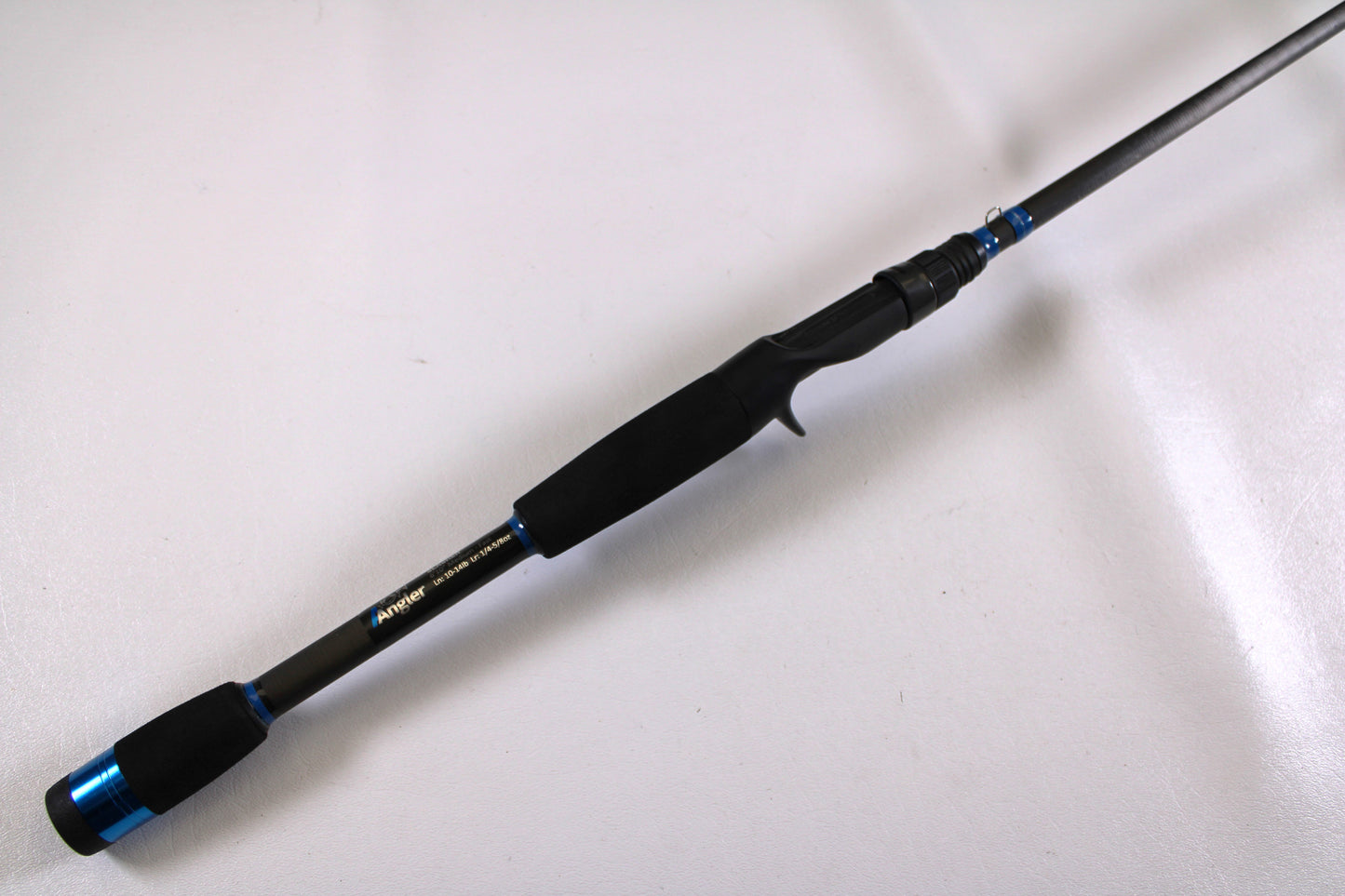 The Alpha Angler Slasher 6'10" Medium Used Casting Rod, in excellent condition with a foam handle and trigger grip, is perfect for upgrading through our rod and reel trade-in program or exploring quality used gear.