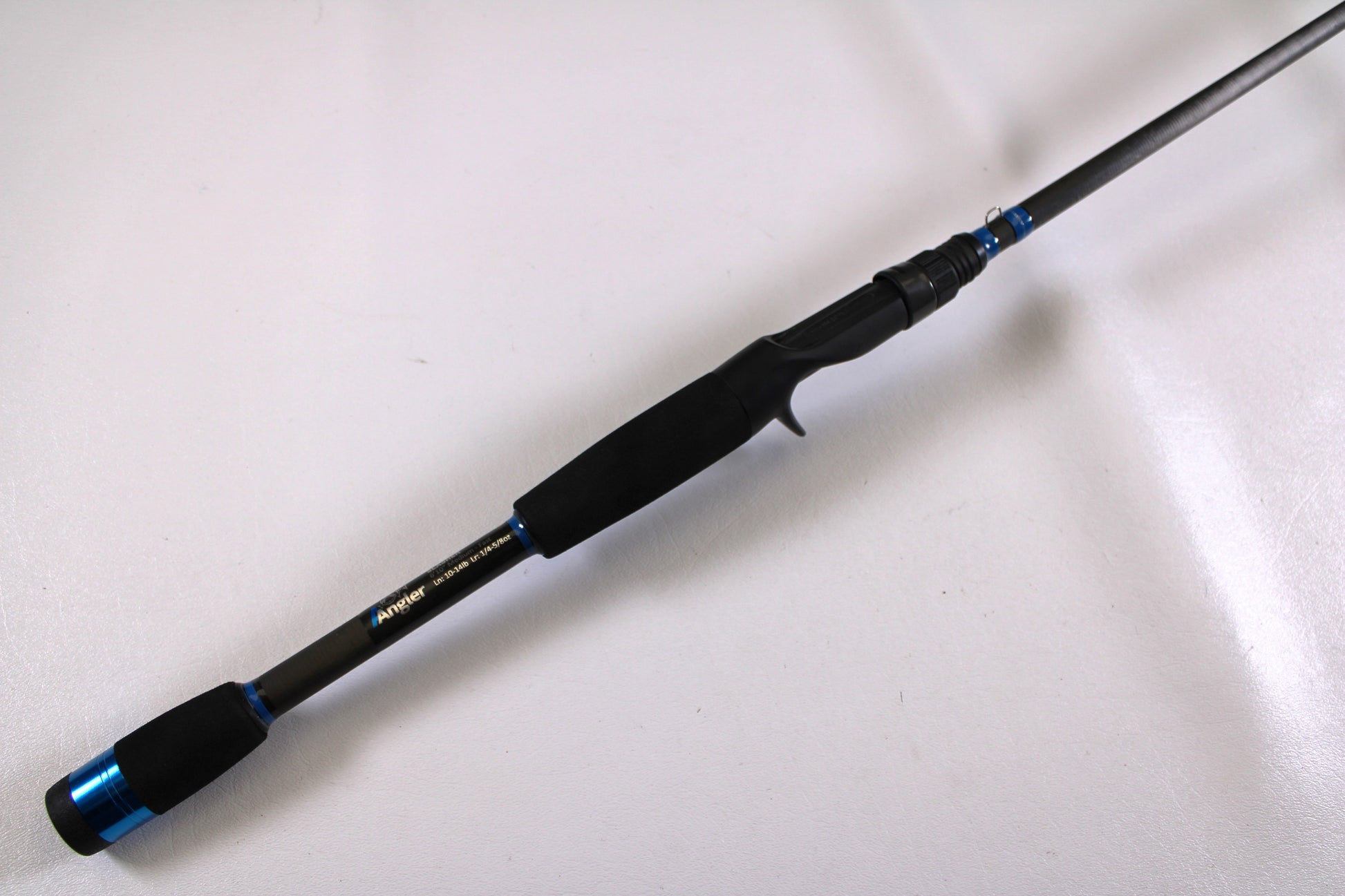 The Alpha Angler Slasher 6'10" Medium Used Casting Rod, in excellent condition with a foam handle and trigger grip, is perfect for upgrading through our rod and reel trade-in program or exploring quality used gear.