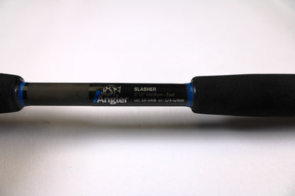 Close-up of the Alpha Angler Slasher 6'10" Medium Used Casting Rod—excellent condition—on a white background, ideal for those seeking pre-owned gear or trading in rods and reels for store credit.