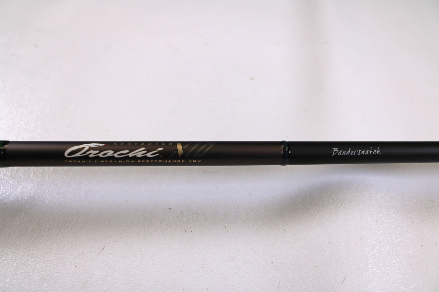 A close-up of the Megabass Orochi X10 F5-70XT Bandersnatch 7'0" Medium Used Casting Rod in excellent condition, ideal for those trading in gear through our Rod and Reel Trade-In Program for store credit.