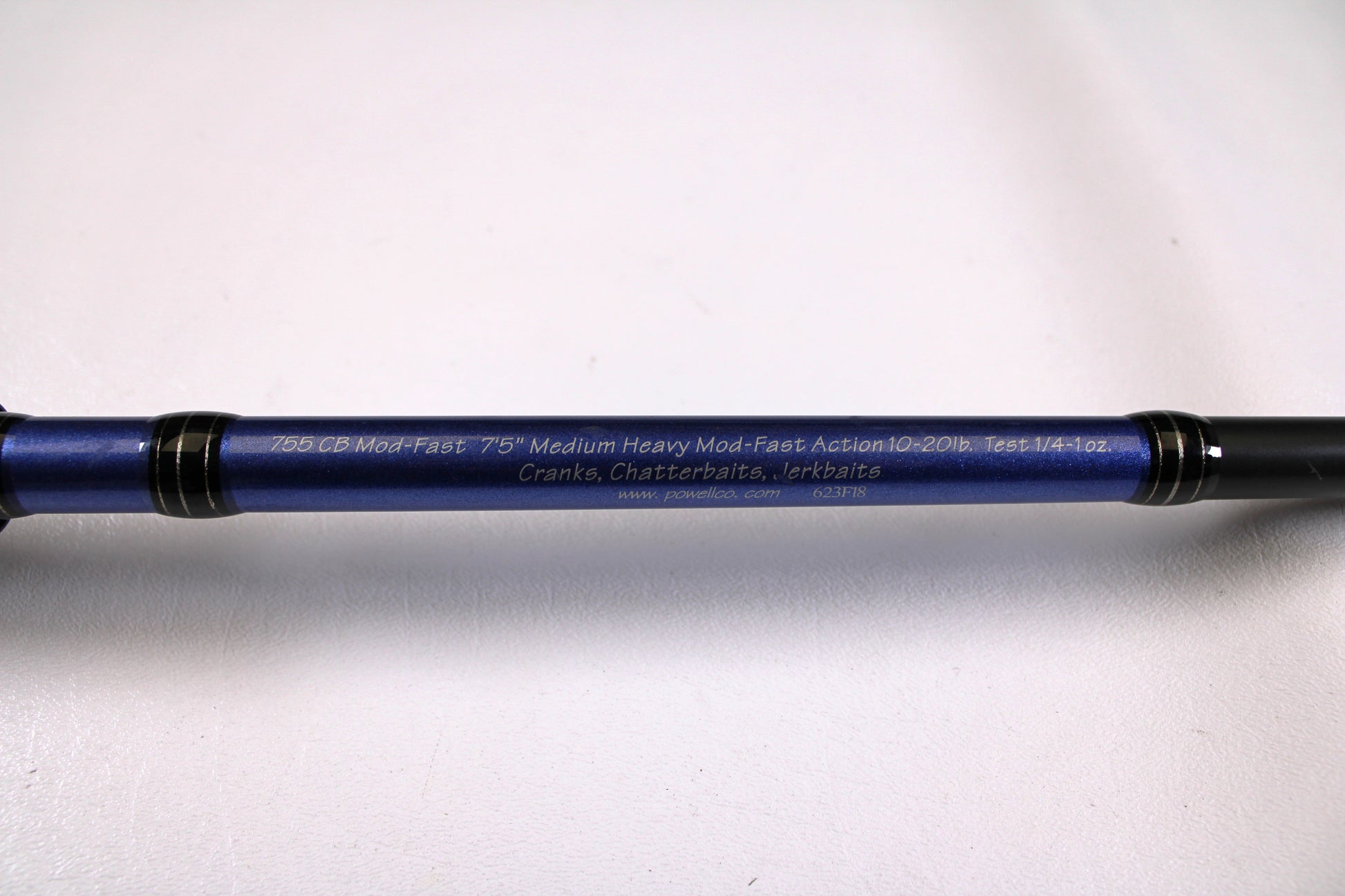 A close-up of the Powell Endurance 755 CB Mod-Fast 7'5" Medium Heavy used casting rod in very good condition, great for crankbaits, chatterbaits, and jerkbaits—ideal for the Rod and Reel Trade-In Program if you want store credit.