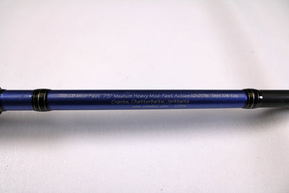 A close-up of the Powell Endurance 755 CB Mod-Fast 7'5" Medium Heavy used casting rod in very good condition, great for crankbaits, chatterbaits, and jerkbaits—ideal for the Rod and Reel Trade-In Program if you want store credit.