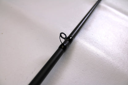 A close-up of the Powell Endurance 755 CB Mod-Fast 7'5" Medium Heavy Used Casting Rod in very good condition, showcasing a line guide—ideal for those trading in used Powell gear for store credit with our Rod and Reel Trade-In Program.