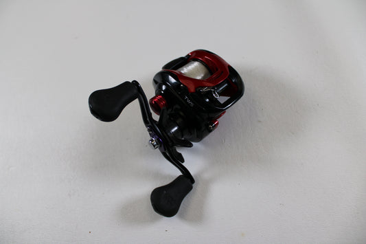 A Daiwa Tatula CT Type-R CT100XS 8.1:1 used casting reel in very good condition is displayed on a white surface—eligible for store credit when traded in through our Rod and Reel Trade-In Program.