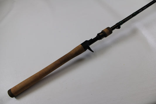A close-up of the G. Loomis Conquest CNQ 905C MBR Used Casting Rod—Very Good Condition—on a white background, ideal for our Rod and Reel Trade-In Program or store credit evaluation on used G. Loomis gear.