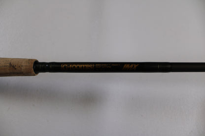 A close-up of the G. Loomis MBR844c IMX 7'0" Heavy Used Casting Rod in good condition, featuring a cork handle—ideal for those seeking value or trading up through our Rod and Reel Trade-In Program for store credit.
