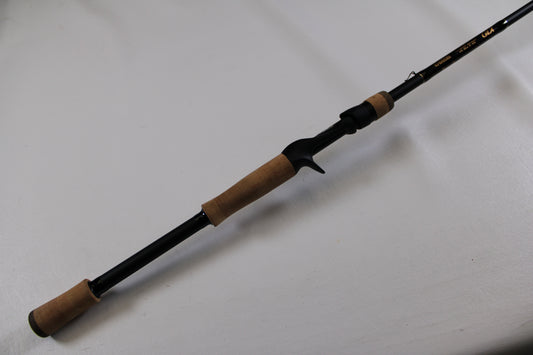 The G. Loomis GLX 893c JWR 7'5" Medium Heavy Used Casting Rod, in excellent condition, features cork handles and is ready for your next Rod and Reel Trade-In or to join your collection of quality gear.