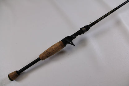 The Falcon Cara T7 CC-5-167S Weightless Worm Used Casting Rod, in good condition, features a cork handle and black reel seat, making it a lightweight choice for freshwater anglers and ideal for our Rod and Reel Trade-In Program.