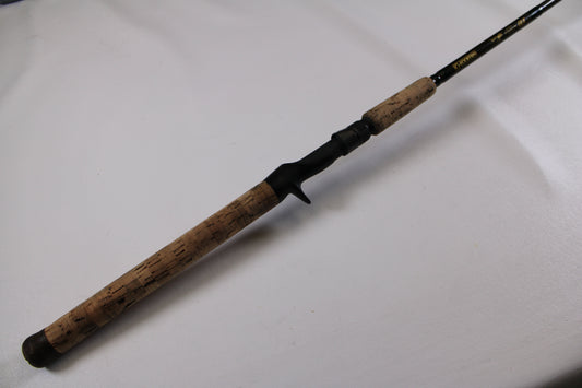 A G. Loomis BCFR894 GLX Casting Rod in good used condition, shown close-up with cork handle and black reel seat—ideal for upgrading through our rod and reel trade-in program to earn store credit on used gear.