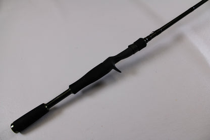 The Evergreen Combat Stick RCTC-68M, a used casting rod in excellent condition, features a split handle and trigger grip—perfect for upgrades through our Rod and Reel Trade-In Program.