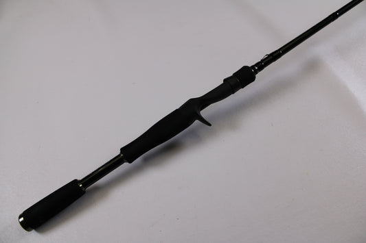 The Evergreen Combat Stick RCTC-68M, a used casting rod in excellent condition, features a split handle and trigger grip—perfect for upgrades through our Rod and Reel Trade-In Program.