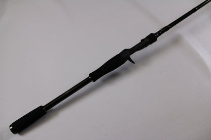 The Evergreen Combat Stick RCTC-73MH Used Casting Rod (Excellent Condition) features a foam handle and trigger grip—perfect for upgrading via our Rod and Reel Trade-In Program or earning store credit on used gear.