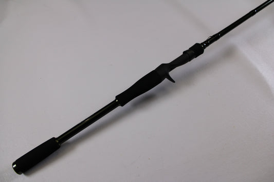 The Evergreen Combat Stick RCTC-73MH Used Casting Rod (Excellent Condition) features a foam handle and trigger grip—perfect for upgrading via our Rod and Reel Trade-In Program or earning store credit on used gear.