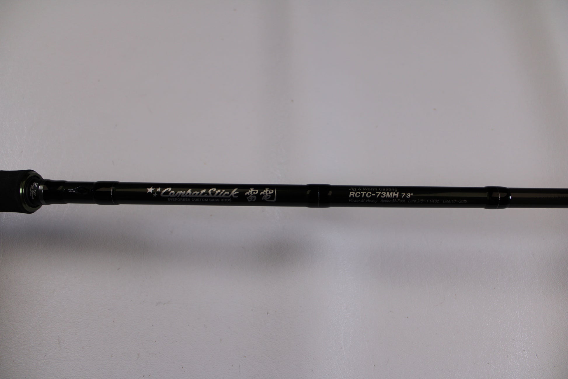 A close-up of the Evergreen Combat Stick RCTC-73MH used casting rod in excellent condition—a great choice for our Rod and Reel Trade-In Program if you're seeking store credit on quality pre-owned Evergreen gear.