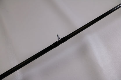 A close-up of the Evergreen Combat Stick RCTC-73MH Used Casting Rod in excellent condition, highlighting a rod guide—ideal for those looking to upgrade with our Rod and Reel Trade-In Program.