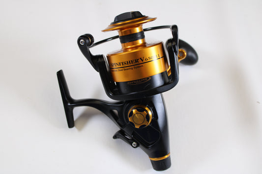 A close-up of a Penn Spinfisher V 6500 SSV6500LL 5.6:1 spinning reel in excellent condition—perfect for anglers to upgrade with our rod and reel trade-in program for store credit on used gear.
