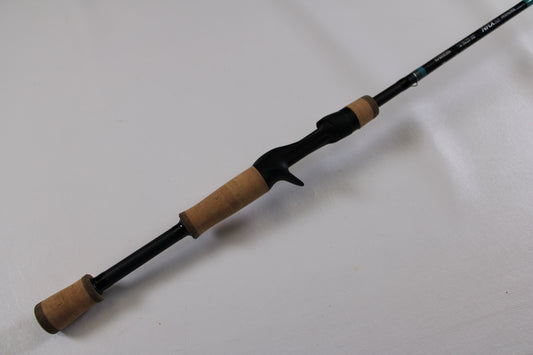 The G. Loomis NRX+ 781c Inshore 6'6" Med-Lite Used Casting Rod in excellent condition is shown on a white background—perfect for our Rod and Reel Trade-In Program. Trade in your used gear for store credit today!.