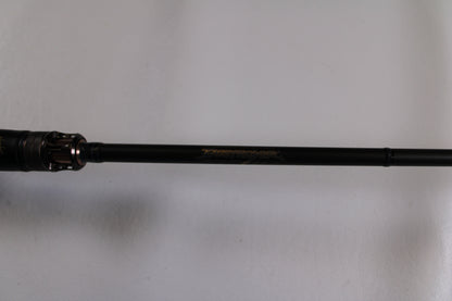 A close-up of the Megabass Destroyer P5 F4-66X Used Casting Rod in excellent condition, featuring gold “Destroyer” lettering on a black shaft—perfect for those exploring our Rod and Reel Trade-In Program or quality used gear.