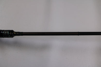 A close-up of the Megabass Orochi X10 F1.1/2-65XT Cliffhanger used casting rod in excellent condition—ideal for highlighting quality gear in our Rod and Reel Trade-In program.