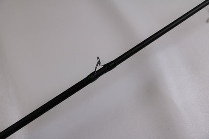 A close-up of the Megabass Orochi X10 F1.1/2-65XT Cliffhanger Used Casting Rod in excellent condition, highlighting a metal line guide—ideal for anglers looking to upgrade or trade in used Megabass gear for store credit.