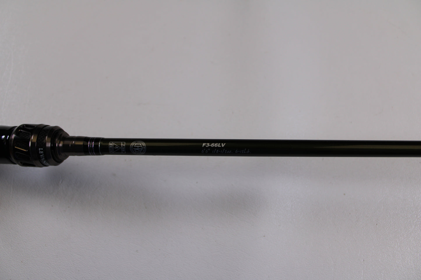 A close-up of the Megabass Levante F3-66LV Used Casting Rod in excellent condition, highlighting the handle and rod shaft—a top pick for fans of Megabass or those exploring our Rod and Reel Trade-In Program.