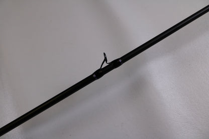 A close-up of the Megabass Levante F3-66LV Used Casting Rod in excellent condition, showing a line guide against a light background—ideal for those interested in used Megabass gear for a Rod and Reel Trade-In Program.