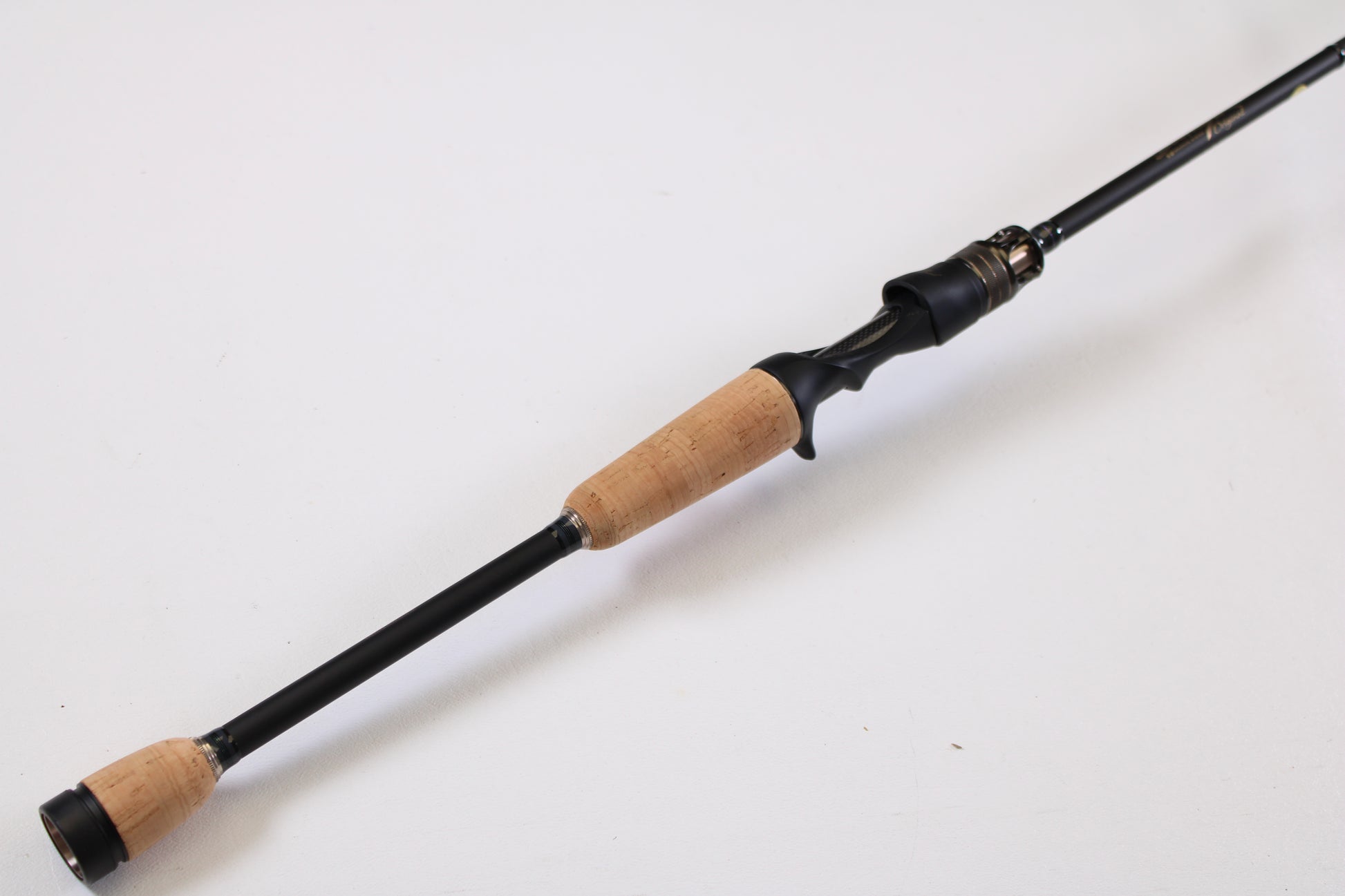 A Megabass Destroyer P5 F2.1/2-611X Kasumi Six Eleven 6'11" Medium Light Used Casting Rod in excellent condition is displayed, perfect for upgrading your gear through our rod and reel trade-in program.
