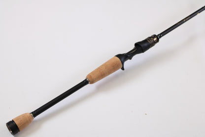 A Megabass Destroyer P5 F2.1/2-611X Kasumi Six Eleven 6'11" Medium Light Used Casting Rod in excellent condition is displayed, perfect for upgrading your gear through our rod and reel trade-in program.