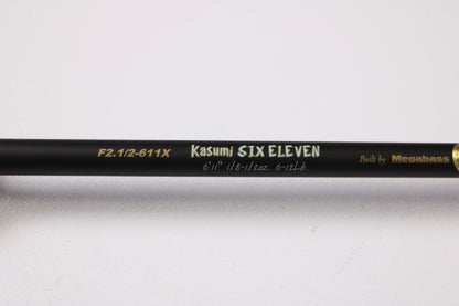 A close-up of the Megabass Destroyer P5 F2.1/2-611X Kasumi Six Eleven 6'11" Medium Light Used Casting Rod in excellent condition—ideal for our rod and reel trade-in program or used gear selection.