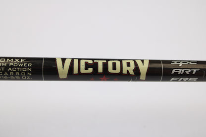 Close-up of a St. Croix Victory VTS68MXF Tactical 6'8" Medium Used Spinning Rod in excellent condition, black and labeled "VICTORY" in bold yellow. Ideal for those looking to trade in gear with our Rod and Reel Trade-In Program.
