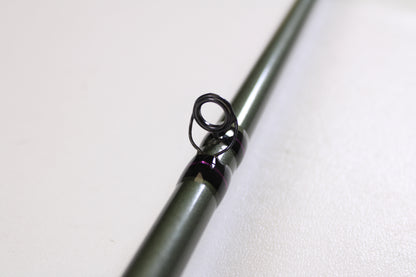 Close-up of a St. Croix Mojo Bass MGC610MM Target Cranker 6'10" Medium Used Casting Rod in excellent condition, with a black guide ring visible against a white background—ideal for used gear enthusiasts or trade-in program participants.