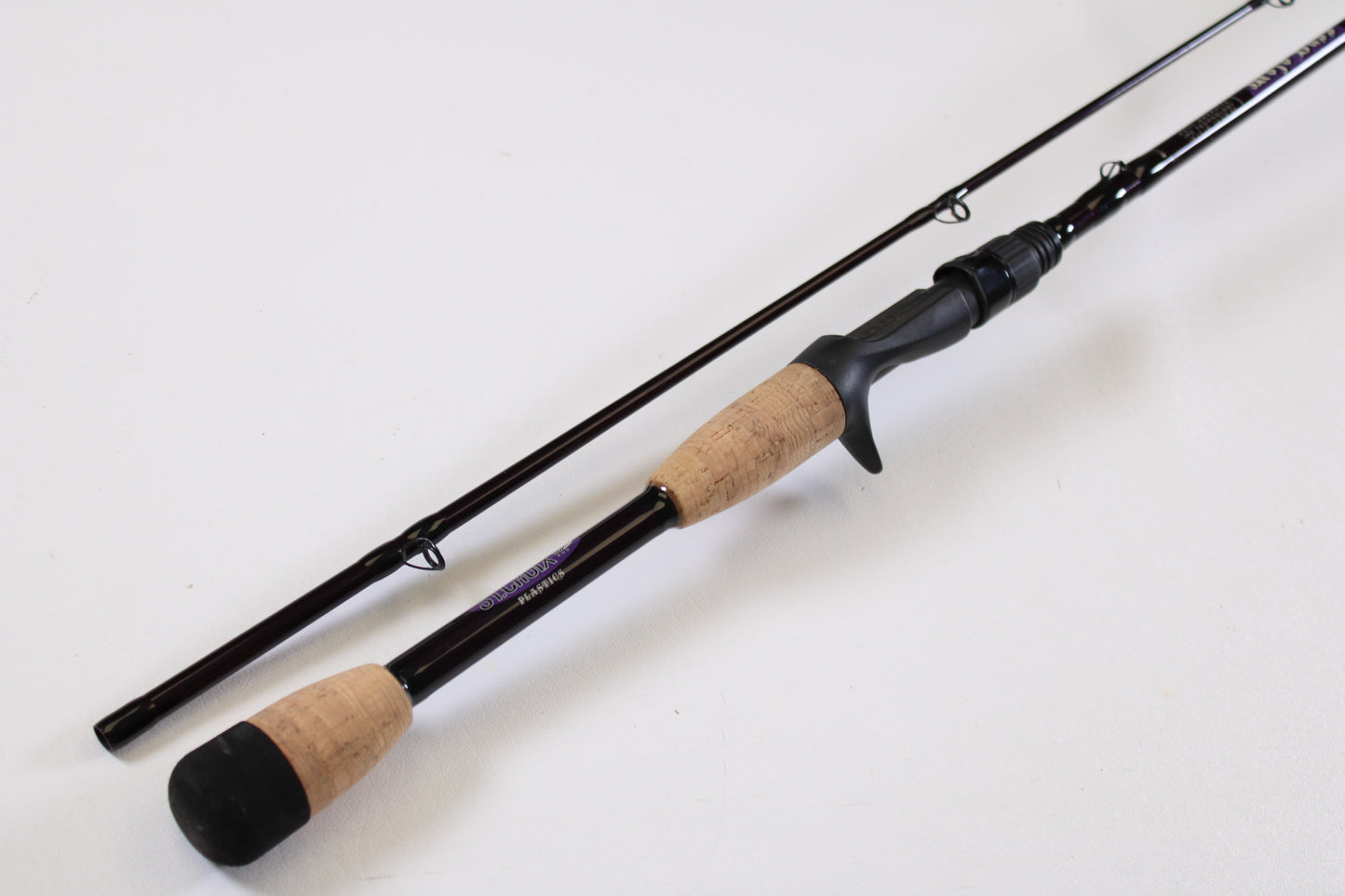 A St. Croix Mojo Bass MJC71MF2 Plastics 7'1" Medium 2-Piece Used Casting Rod in excellent condition is shown—ideal for those interested in our Rod and Reel Trade-In Program.