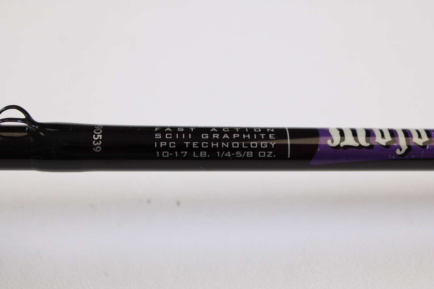 Close-up of the St. Croix Mojo Bass MJC71MF2 Plastics 7'1" Medium 2 Piece Used Casting Rod in excellent condition, showing "FAST ACTION SCIII GRAPHITE IPC TECHNOLOGY 10-17 LB. 1/4-5/8 OZ." Eligible for our Rod and Reel Trade-In Program.