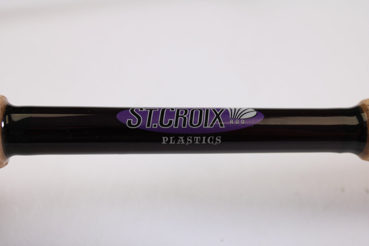 A close-up of the St. Croix Mojo Bass MJC71MF2 Plastics 7'1" Medium 2 Piece Used Casting Rod in excellent condition, perfect for upgrading your gear through our Rod and Reel Trade-In Program for store credit.