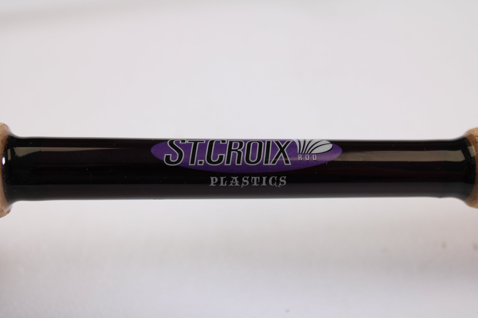A close-up of the St. Croix Mojo Bass MJC71MF2 Plastics 7'1" Medium 2 Piece Used Casting Rod in excellent condition, perfect for upgrading your gear through our Rod and Reel Trade-In Program for store credit.