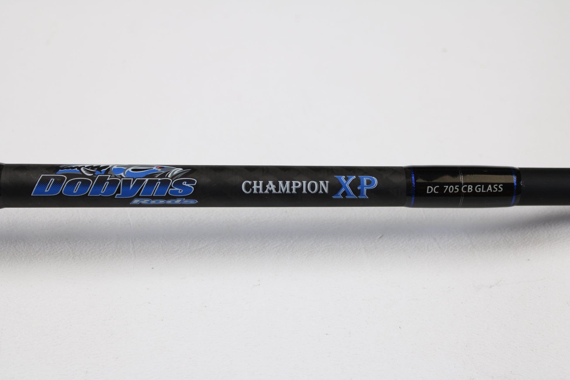 Close-up of a Dobyns Champion XP DC705CBGLASS 7'0" Medium Heavy Used Casting Rod in excellent condition, ideal for those interested in used gear or our Rod and Reel Trade-In Program, set against a plain white background.