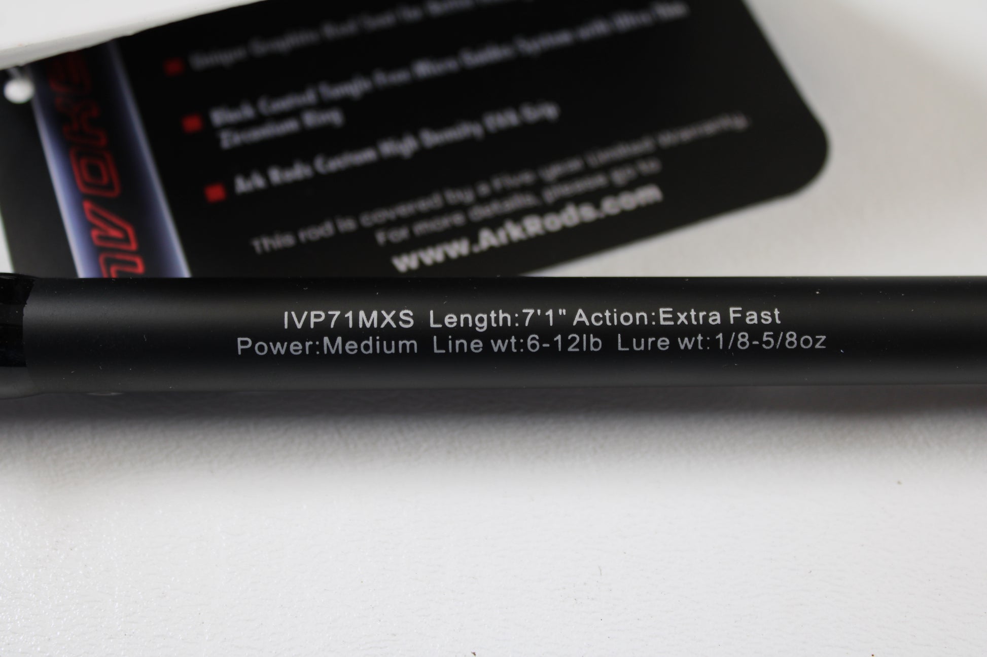 A close-up of the Ark Fishing Invoker Pro IVP71MXS 7'1" Medium Used Spinning Rod (Extra Fast Action, 6-12 lb line, 1/8-5/8 oz lure) in excellent condition—ideal for your next rod and reel trade-in for store credit.