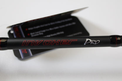 Close-up of a black Ark Fishing Invoker Pro IVP71MXS 7'1" Medium spinning rod in excellent used condition, labeled in red and white, ideal for anglers seeking store credit or trade-in on used rods and reels.