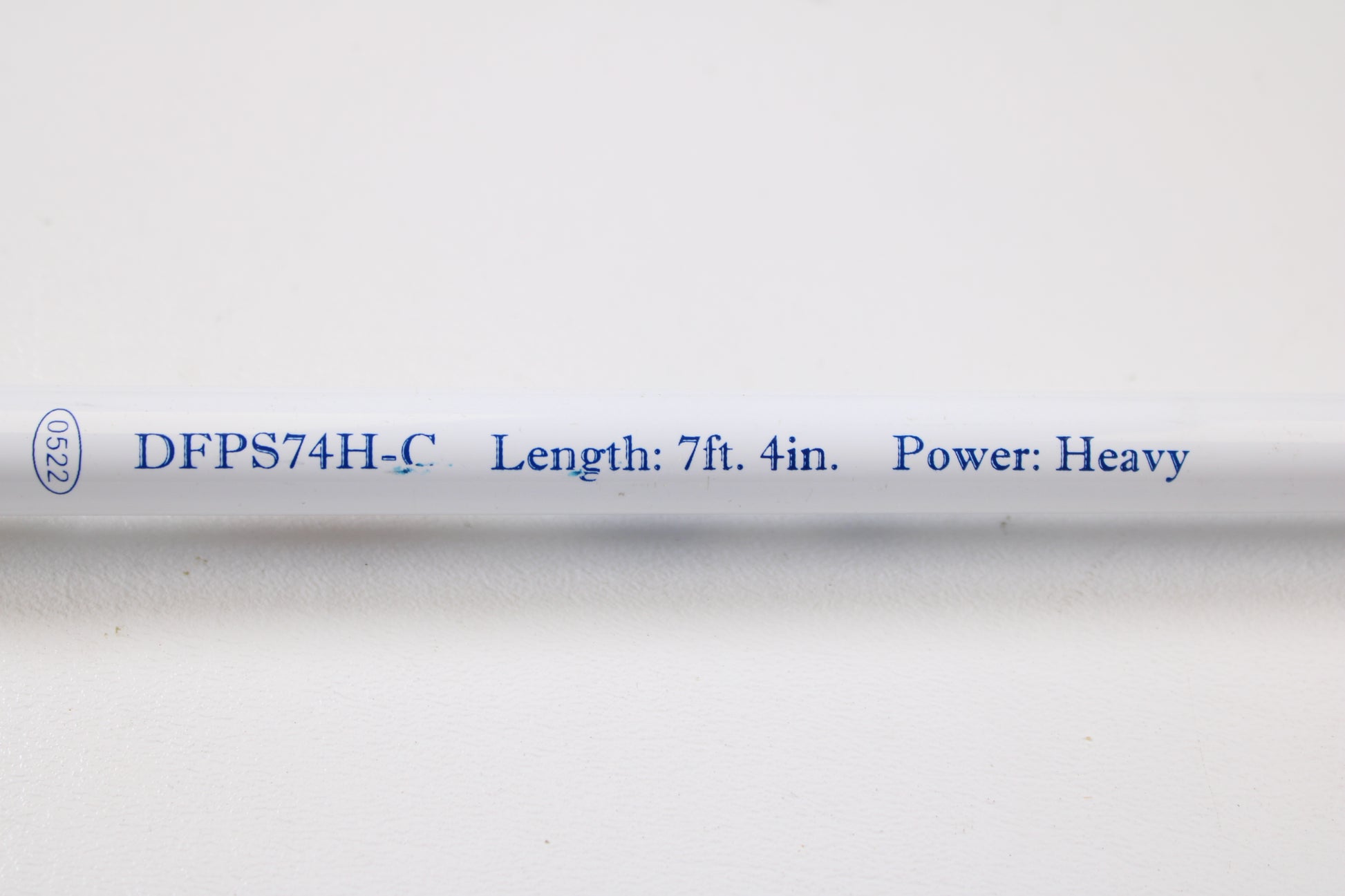 A close-up of a Duckett Pro Series DFPS74H-C Chris Lane 7'4" Heavy Used Casting Rod in excellent condition, perfect for maximizing store credit during our rod and reel trade-in event.