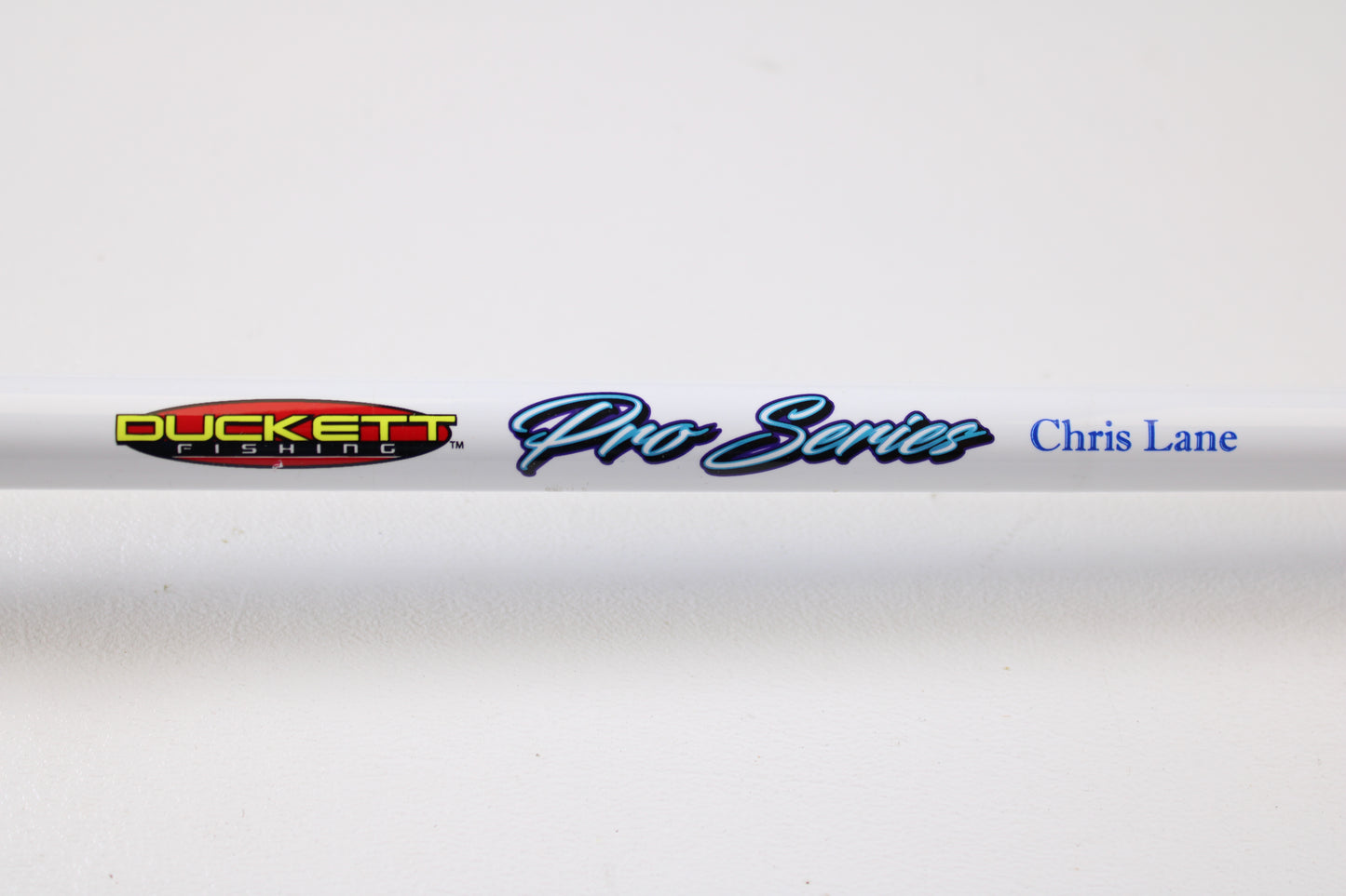 A close-up of a Duckett Pro Series DFPS74H-C Chris Lane 7'4" Heavy Used Casting Rod in excellent condition, ideal for used gear shoppers or those looking to trade in a rod and reel for store credit.
