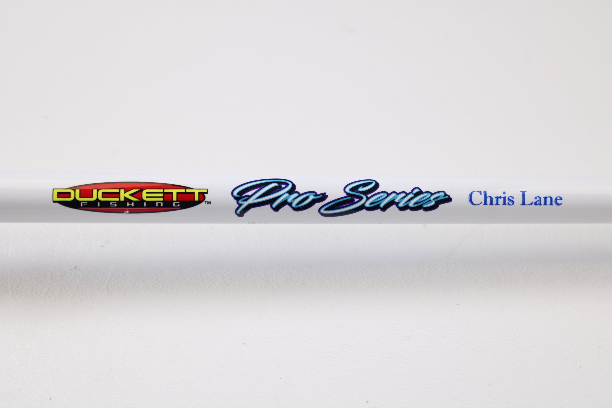 A close-up of a Duckett Pro Series DFPS74H-C Chris Lane 7'4" Heavy Used Casting Rod in excellent condition, ideal for used gear shoppers or those looking to trade in a rod and reel for store credit.