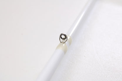 Close-up of a Duckett Pro Series DFPS74H-C Chris Lane 7'4" Heavy used casting rod in excellent condition, highlighting a single metal line guide with light wrap—ideal for anglers seeking quality pre-owned gear or considering a trade-in.