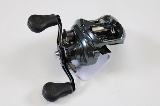 A close-up of the Daiwa Tatula SV TW TTUSV103XS 8.1:1 RH casting reel in good used condition—ideal if you're interested in quality pre-owned gear or our rod and reel trade-in program.